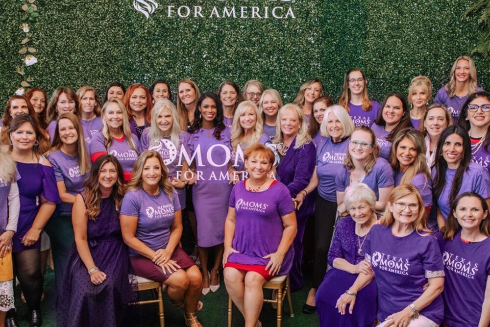 A large group of Moms for America members posing together