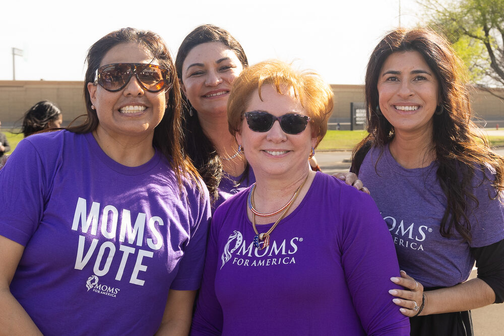 Moms for America members at an outdoor event